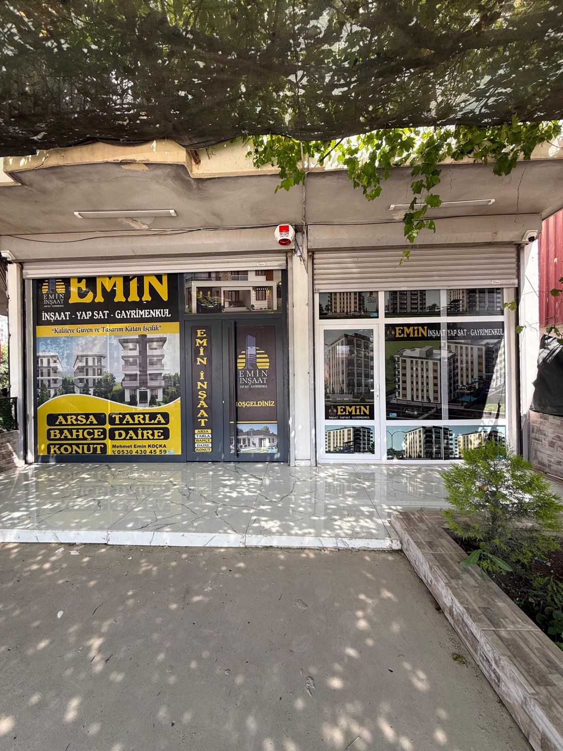 Emin İnşaat — Adana ofis / mağaza vitrini